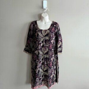 Embroidered silk East Indian kurta with floral design.